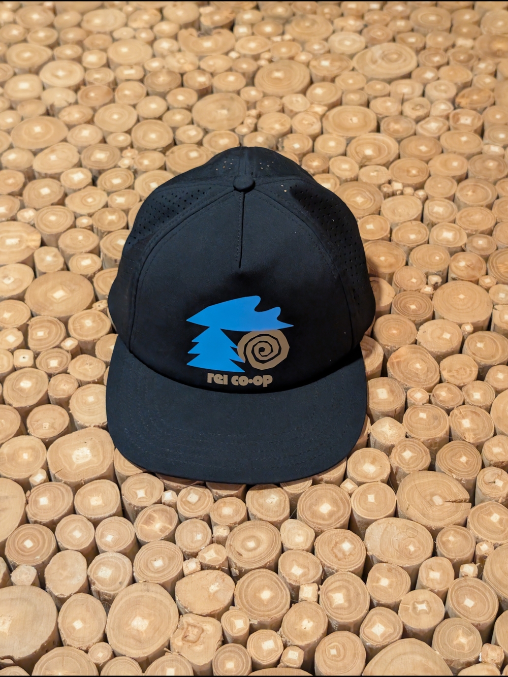 REI Co-Op Black Breathable Hat with Tan and Blue Logo